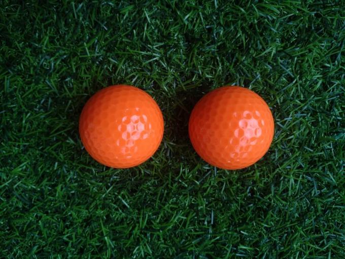 fluorescent golf ball , golf balls , fluorescent golf balls in black