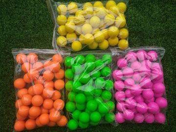 fluorescent golf ball golf balls fluorescent golf balls in black light (glow in uv ) supplier